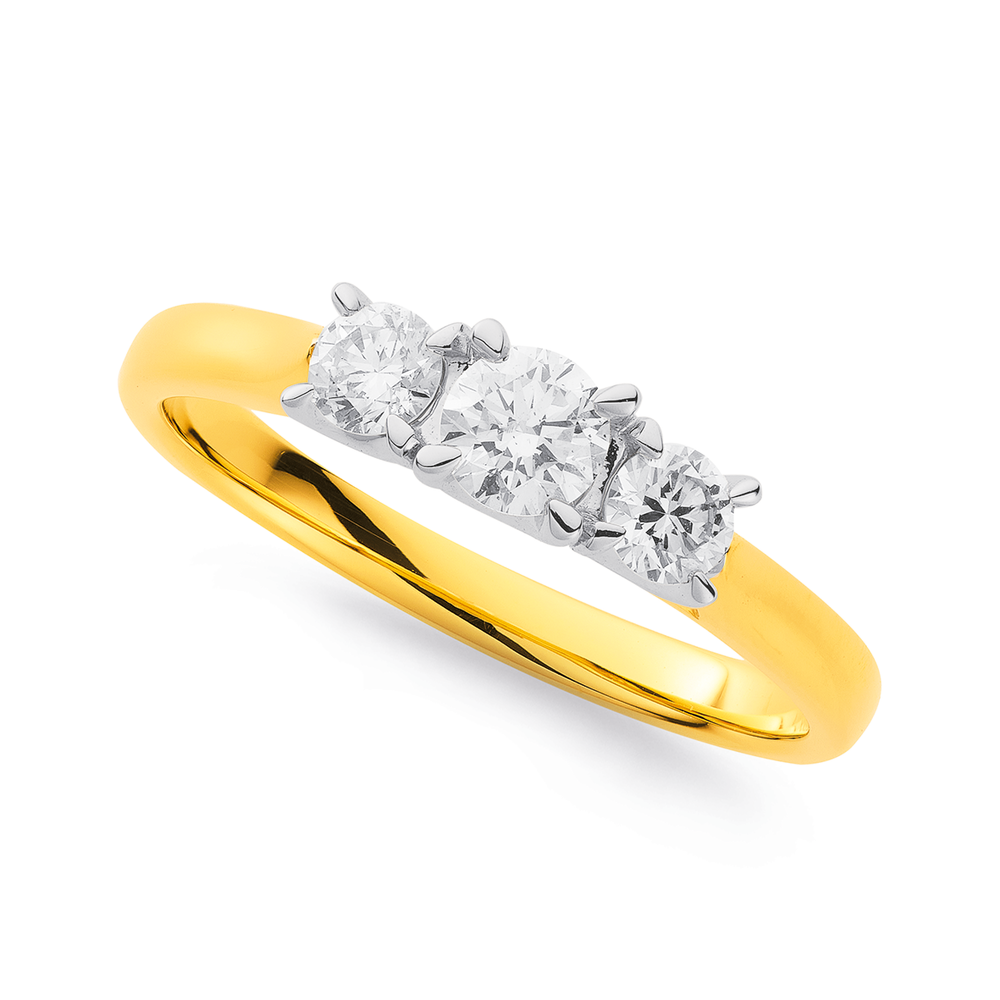 0.20cts. Solitaire with Pear Cut Diamond Accents 18K Yellow Gold Ring