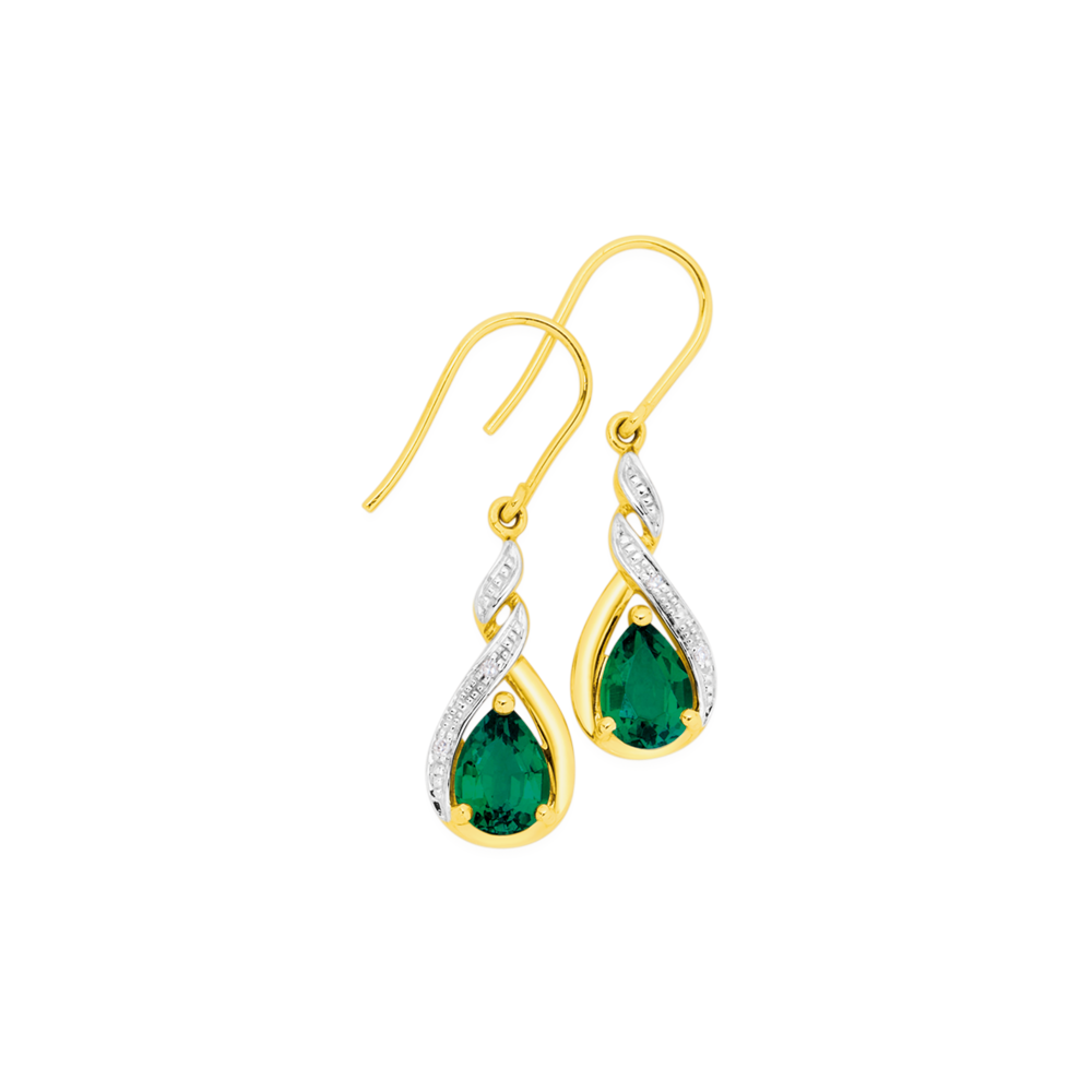 ASOS DESIGN drop earrings with oversized emerald tone crystal detail in  gold tone | ASOS